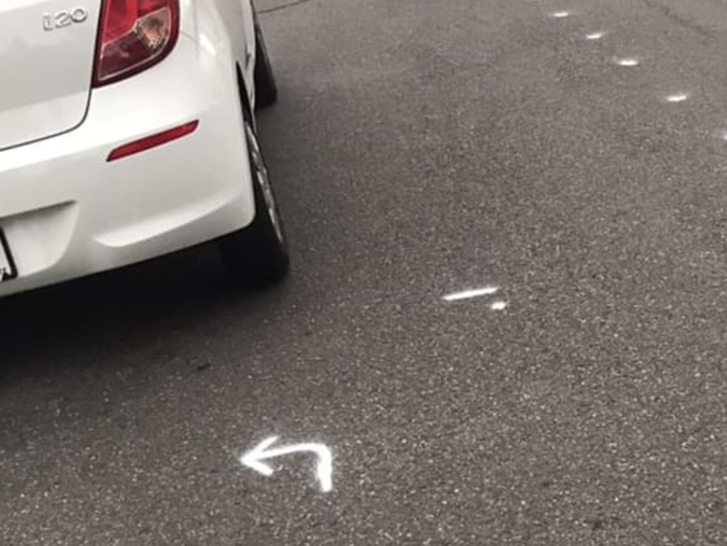 Ethel Chan noticed white markings around her car but claims she was not notified the works would be taking place. Picture: Supplied