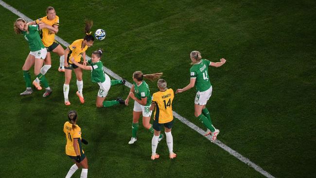 Raso (3rd L) attempts to head the ball past Ireland's midfielder Sinead Farrelly. Picture: AFP