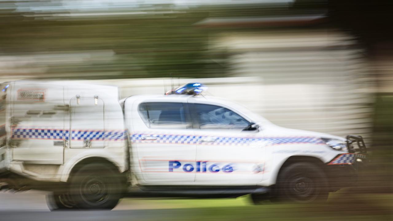 A police vehicle under lights and sirens. Picture: Kevin Farmer