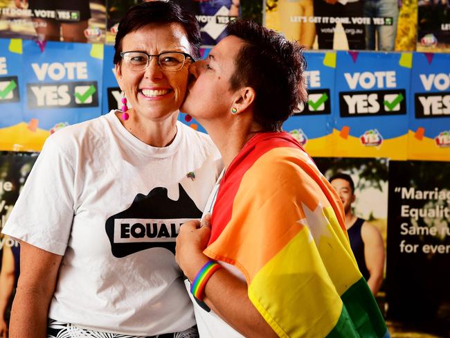 Darwin:Territorians Kirsty Hunt with Amber Sayers celebrate the Same Sex Marriage yes vote announcement on Monday morning at the Oaks Hotel in Darwin. Picture: Justin Kennedy