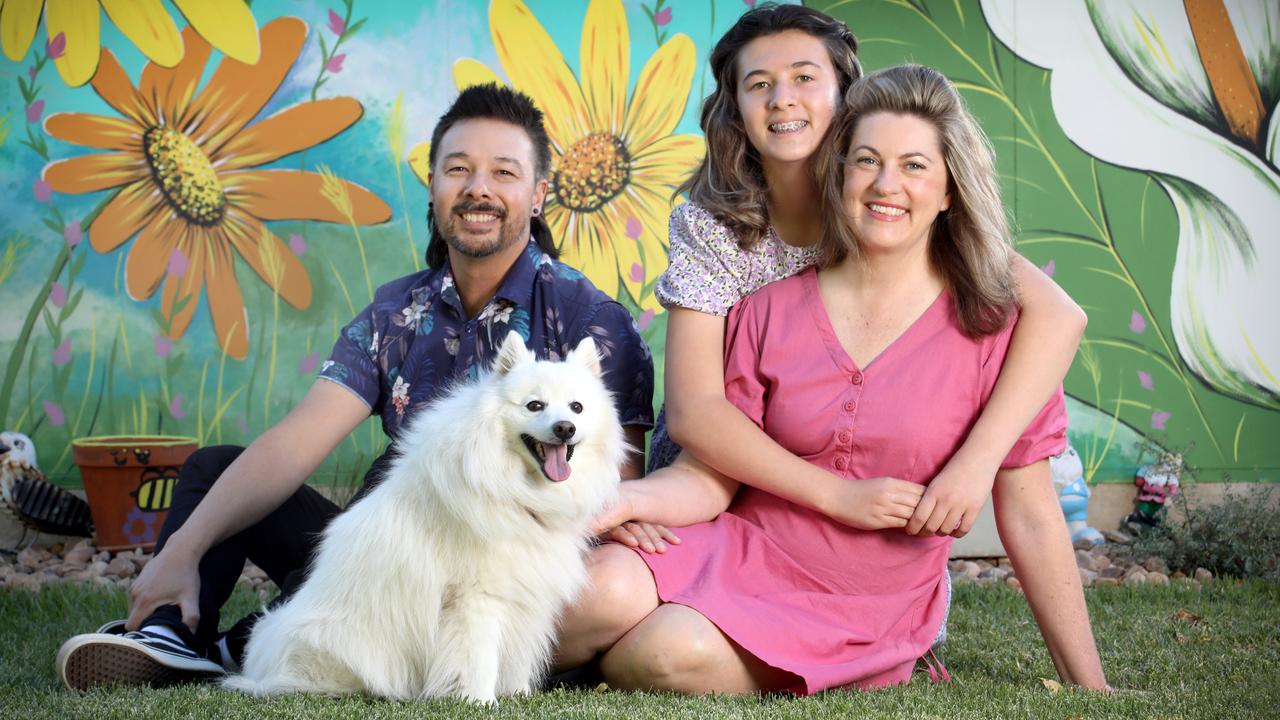 Cherie Lee with husband Simon, daughter Aria, 13, and dog Spirit. Picture: Dean Martin