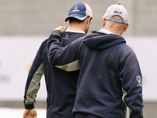 Victorian Bushrangers coach Greg Shipperd comforts wicket-keeper Matthew Wade. Picture: Wayne Ludbey