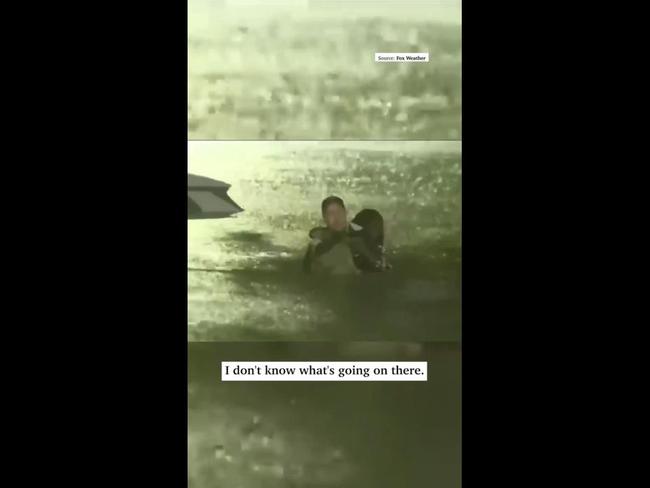 Reporter saves woman stuck in flood from Hurricane Helene