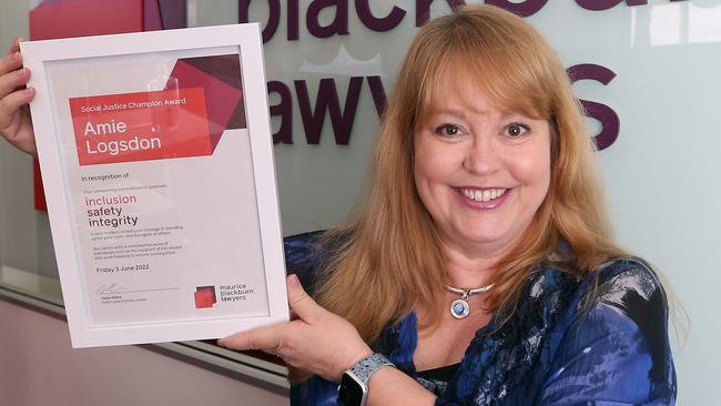 Amie Logsdon receives a social justice award at Maurice Blackburn Lawyers. Picture: Richard Gosling