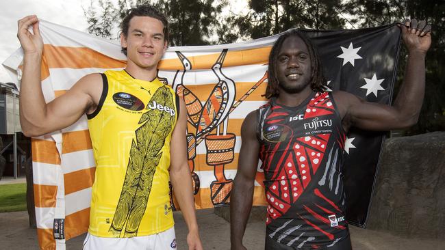 Richmond’s Daniel Rioli and Essendon’s Anthony McDonald-Tipungwuti. Picture: Michael Klein