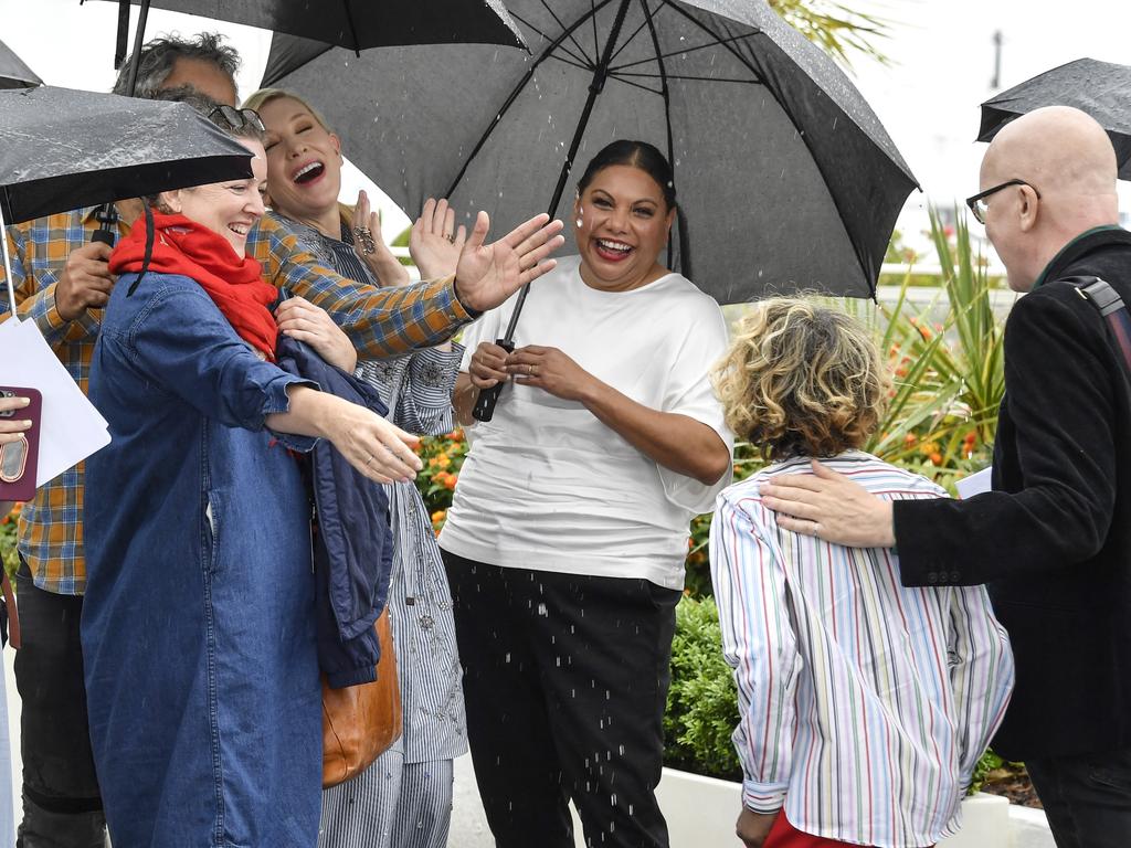 Wayne Blair, Cate Blanchett and Deborah Mailman laughing during the rain. Picture: Getty Images