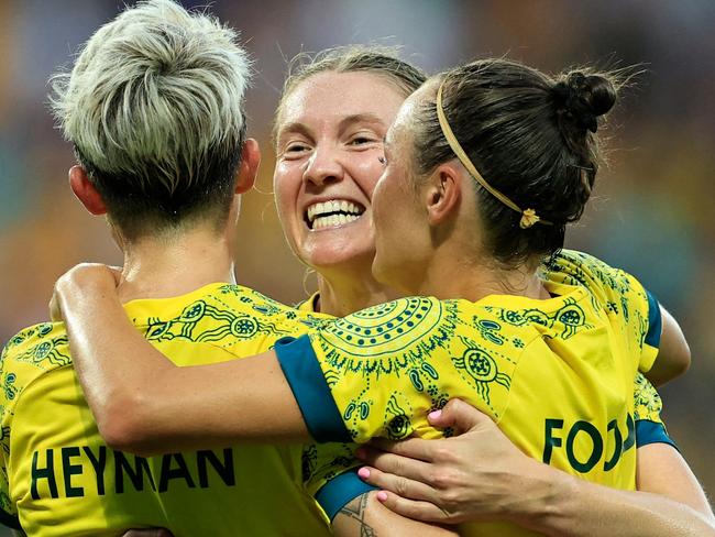 Australia's forward #02 Michelle Heyman celebrates scoring her team's sixth goal with teammates in the women's group B football match between Australia and Zambia during the Paris 2024 Olympic Games at the Nice Stadium in Nice on July 28, 2024. (Photo by Valery HACHE / AFP)