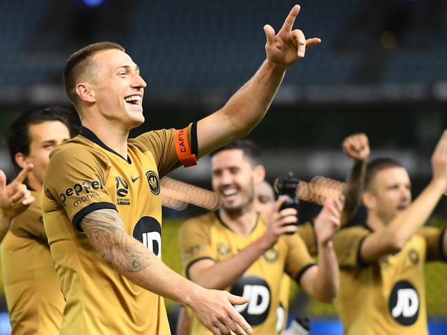 MELBOURNE, AUSTRALIA - OCTOBER 18: Mitchell Duke and his Wanderers team mates celebrate winning the round two A-League match between Melbourne Victory and the Western Sydney Wanderers at Marvel Stadium on October 18, 2019 in Melbourne, Australia. (Photo by Quinn Rooney/Getty Images)