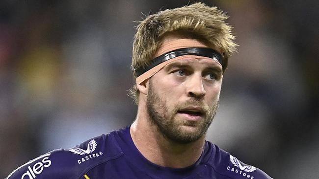 Christian Welch of the Storm looks on during the round 14 NRL match between North Queensland Cowboys and Melbourne Storm at Qld Country Bank Stadium on June 04, 2023 in Townsville, Australia. (Photo by Ian Hitchcock/Getty Images)