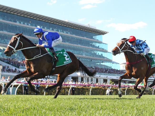 MELBOURNE, AUSTRALIA - OCTOBER 06:  Hugh Bowman riding Winx wins race 5 the TAB Turnbull Stakes ahead of Craig Williams riding Youngstar  during Melbourne Racing at Flemington Racecourse on October 6, 2018 in Melbourne, Australia.  (Photo by Scott Barbour/Getty Images)