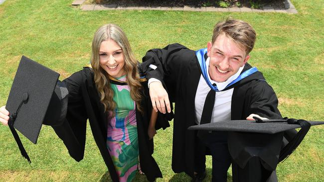 Pharmacy graduate Eren White and Medicine graduate Patrick de Waele at the James Cook University graduation at Townsville Entertainment Centre. Picture: Shae Beplate.