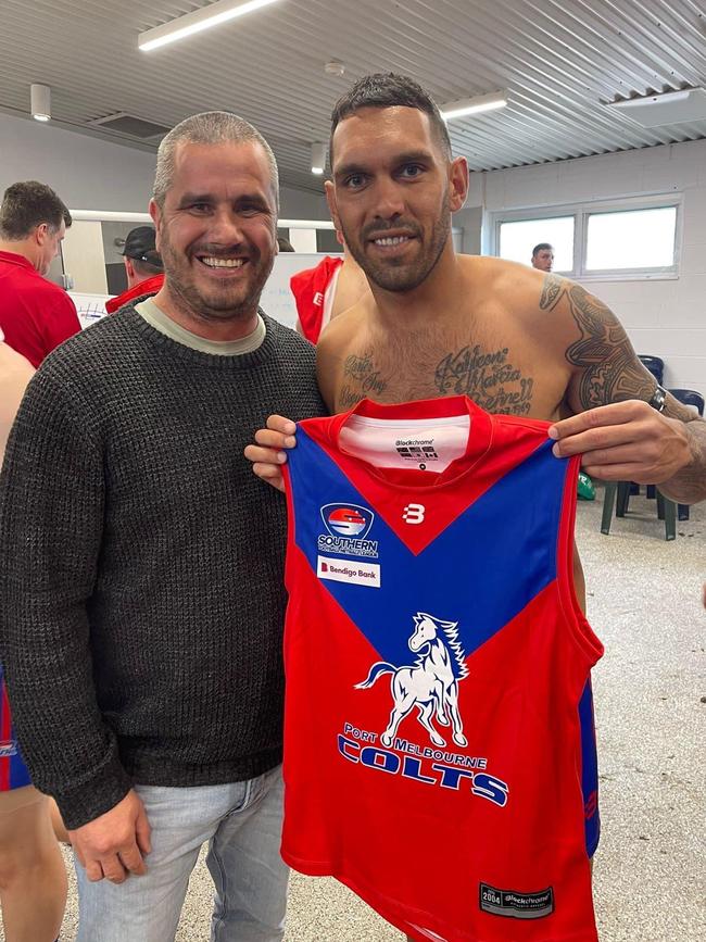 Harley Bennell (right) with his Colts jumper.