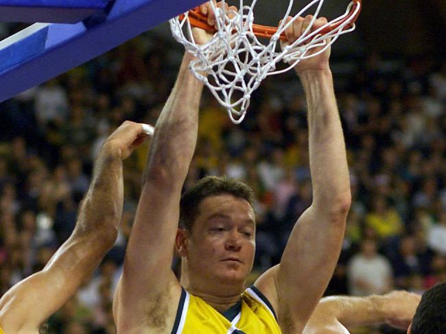 Longley slam dunks for the Boomers against Spain at the Sydney Olympics. Picture: David Kapernick.