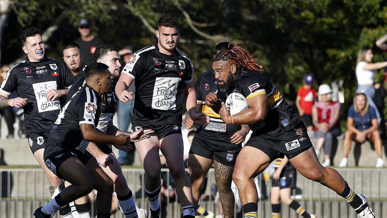 Matraville's Sione Tovo with the ball. Picture: John Appleyard