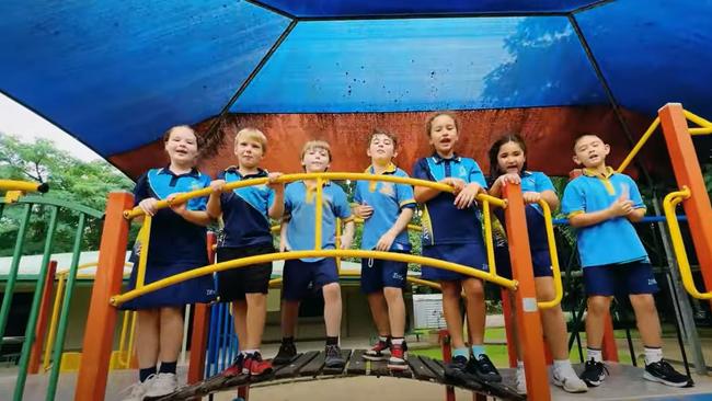 Tully State School has celebrated the town's centenary with a new song 'Tumblin' Tully Rain' co-created by students Queensland country musician Josh Arnold.