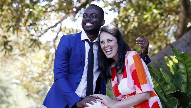 Daniel Mensah Adobaw, 40, originally from Ghana, celebrates becoming an Australian citizen with his wife, Nadia Samperi, 32, at Government House in Sydney. Picture: Nikki Short