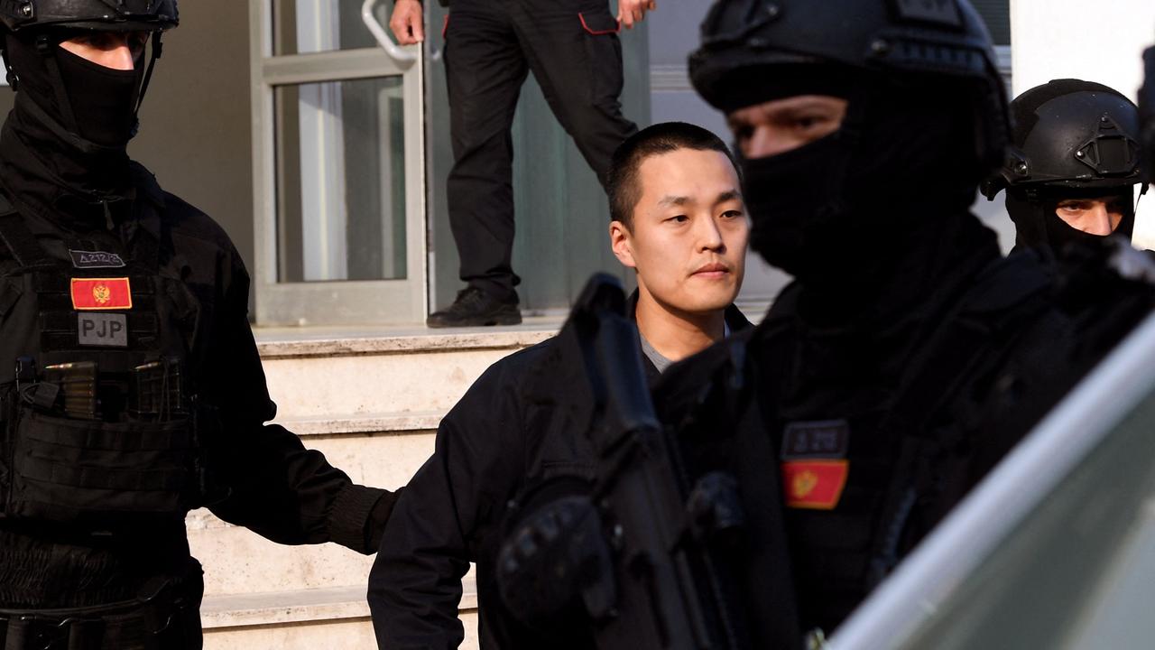 Montenegrin police escort Do Kwon outside court in Podgorica. Picture: Savo Prelevic/AFP