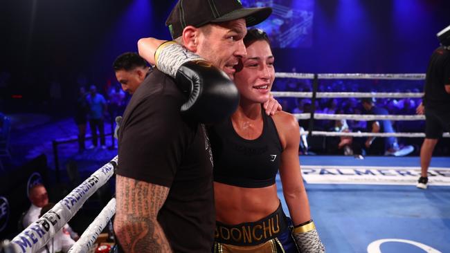 GOLD COAST, AUSTRALIA - DECEMBER 03:  Jasmine Parr and John Wayne Parr celebrate winning the WIBA Flyweight World Title fight against Nicila Costello at The Star Gold Coast on December 03, 2022 in Gold Coast, Australia. (Photo by Chris Hyde/Getty Images)