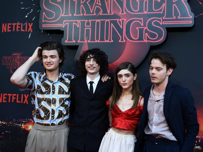 US actor Joe Keery, Canadian actor Finn Wolfhard, US actress Natalia Dyer and British actor Charlie Heaton for the premiere of season 3 of Stranger Things in July last year. Picture: Martin Bureau/AFP