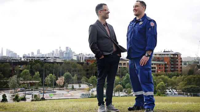 Treasurer Daniel Mookhey talks about the housing plan with paramedic Michael Hobson. Picture: Sam Ruttyn