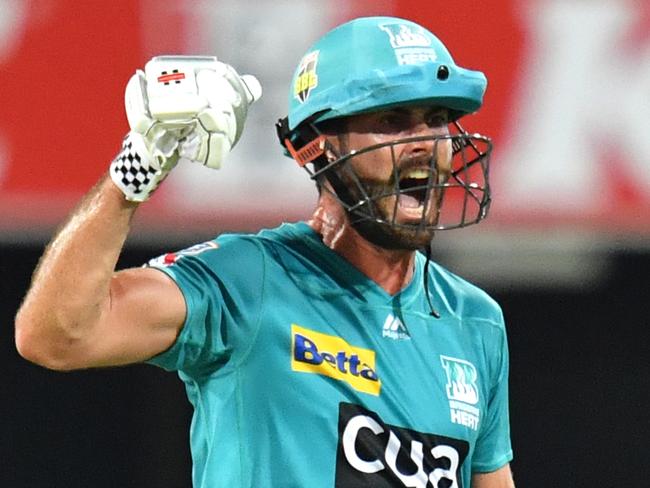 Ben Cutting of the Heat celebrates hitting the winning runs during the Big Bash League (BBL) cricket match between the Brisbane Heat and the Hobart Hurricanes at The Gabba in Brisbane, Thursday, January 9, 2020. (AAP Image/Darren England) NO ARCHIVING, EDITORIAL USE ONLY, IMAGES TO BE USED FOR NEWS REPORTING PURPOSES ONLY, NO COMMERCIAL USE WHATSOEVER, NO USE IN BOOKS WITHOUT PRIOR WRITTEN CONSENT FROM AAP