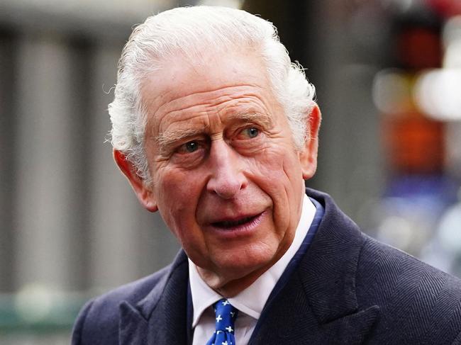 Britain's Prince Charles, Prince of Wales gestures during a visit to view two alternative fuel green trains as part of Network Rail's 'Green Trains @ COP26' event at Glasgow Central Station on November 5, 2021, on the sidelines of the COP26 UN Climate Change Conference . - With science warning that only swift action can avoid cataclysmic global warming, countries already feeling the lash of climate change are demanding that the timetable for updating national carbon-cutting pledges be radically accelerated. (Photo by Jane Barlow / POOL / AFP)