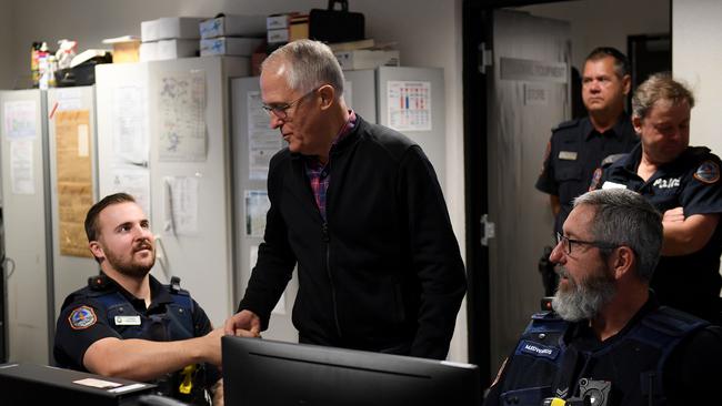 Then Prime Minister Malcolm Turnbull visiting Tennant Creek Police Station. Picture: AAP Image/Dan Himbrechts