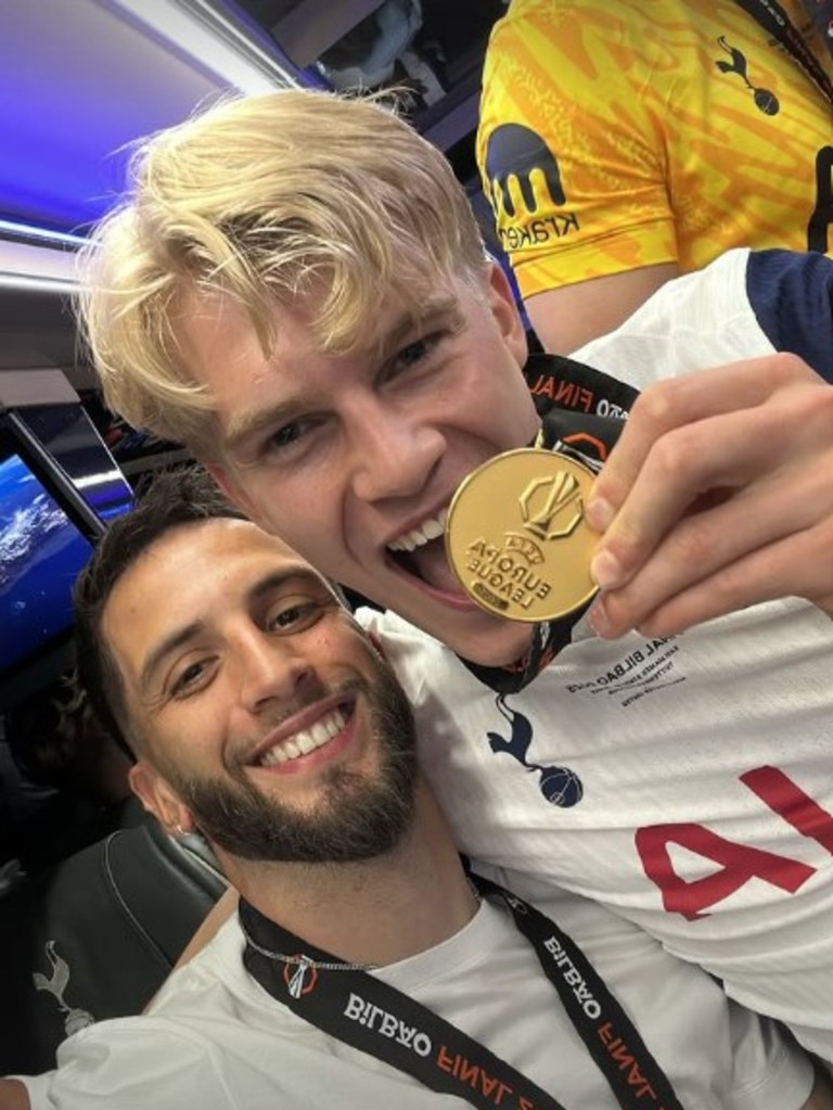 Lucas Bergvall and Rodrigo Bentancur celebrate with their medals.