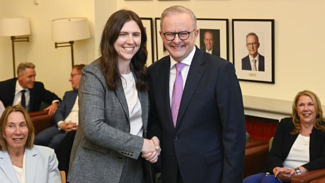 Emma Comer, the new MP for Petrie, with Prime Minister Anthony Albanese at the Labor Party’s caucus at Parliament House in Canberra. Picture: Martin Ollman/NewsWire