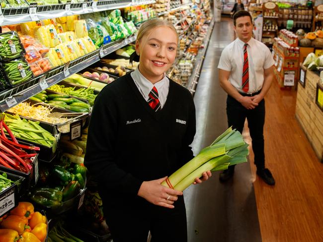 Annabelle Boyd-Turner (year 12) and Sean Comley (year 11) at North Adelaide Foodland on July 31, 2020. Picture Matt Turner.