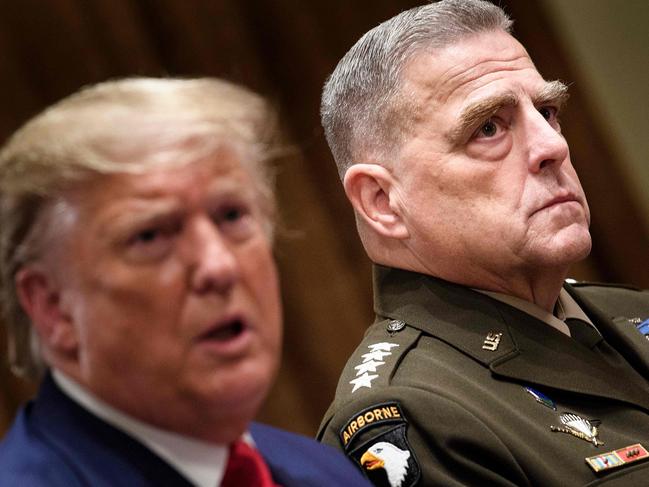 Then Chairman of the Joint Chiefs of Staff Army General Mark Milley listens while US President Donald Trump speaks before a meeting with senior military leaders in the Cabinet Room of the White House in 2020. Picture: AFP