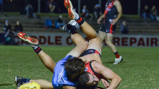 West's Lyndon Hupfeld and Sturt's Luke Edmonds comes to grips. Picture: Brenton Edwards