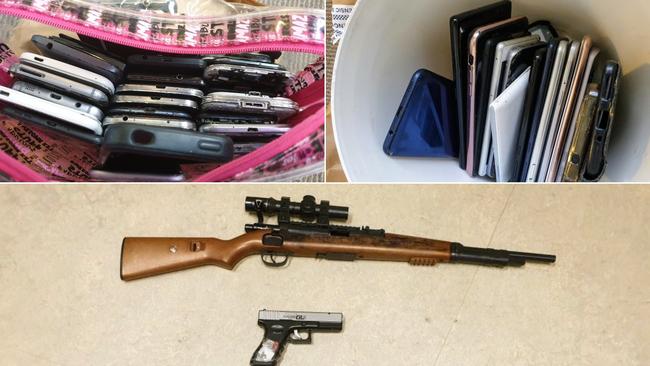 Wagga police seized two guns and about 30 mobile phones after they raided a Tolland house yesterday. Picture: Riverina Police District