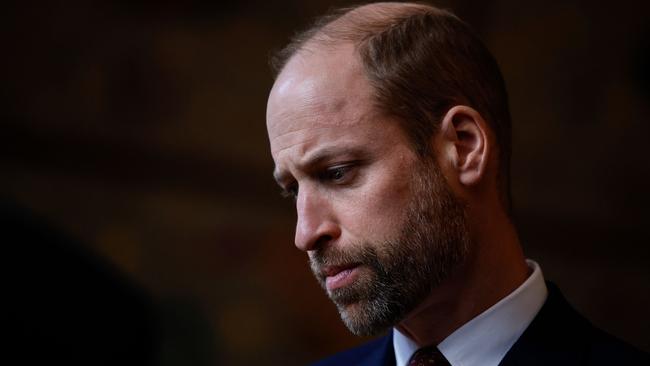 TOPSHOT - Britain's Prince William, Prince of Wales, Co-Patron of the âJewel of Arabia Expeditionâ reacts as he attends the launch of the expedition at the Royal Geographical Society, in London, on November 25, 2024. The Expedition aims to raise awareness amongst young people both in and outside of Oman of the value of Omanâs natural heritage and biodiversity as well as the environmental challenges the country and the wider world face. (Photo by BENJAMIN CREMEL / POOL / AFP)