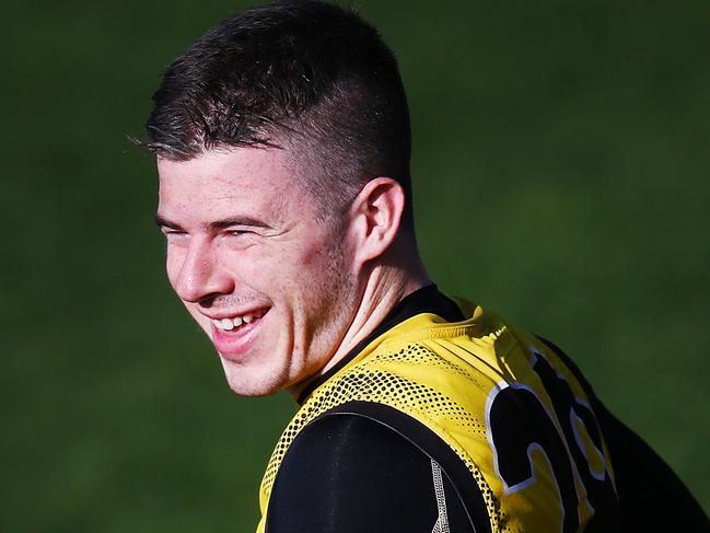 MELBOURNE, AUSTRALIA - JULY 24:  Rising Star nominee this week Jack Higgins of the Tigers reacts during a Richmond Tigers AFL training session at Punt Road Oval on July 24, 2018 in Melbourne, Australia.  (Photo by Michael Dodge/Getty Images)