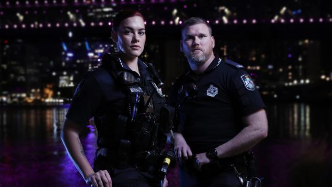 Queensland Police Constables Liv Smith and Pete Carroll have endured some horrifying scenes as cops on the night shift. Picture: Richard Dobson