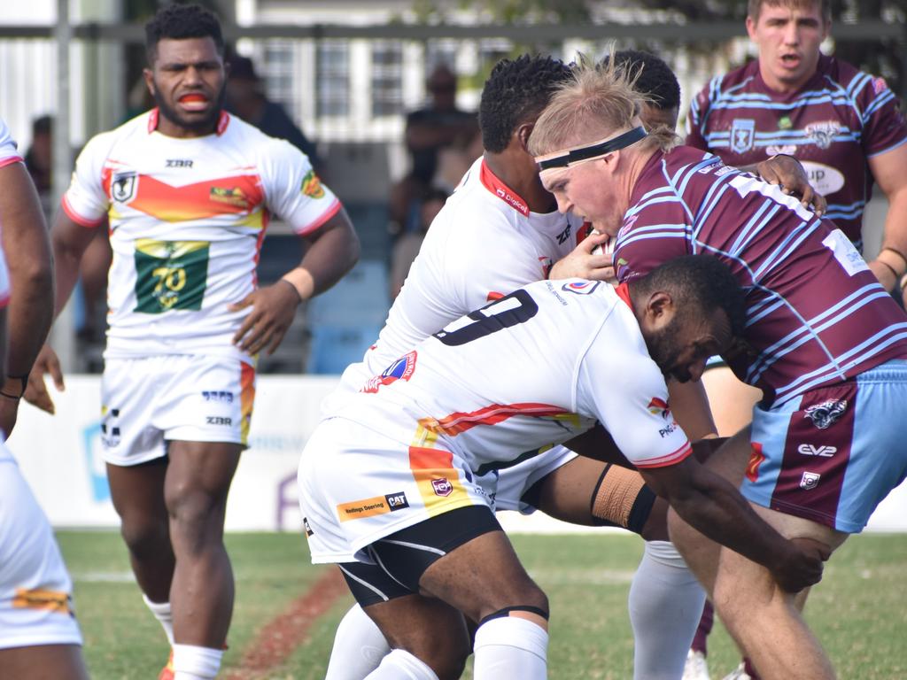 CQ Capras’ lock Jamie Hill makes a barnstorming run against the PNG Hunters.