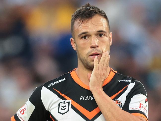 SYDNEY, AUSTRALIA - APRIL 10:  Luke Brooks of the Wests Tigers looks dejected during the round six NRL match between Wests Tigers and Parramatta Eels at Accor Stadium on April 10, 2023 in Sydney, Australia. (Photo by Mark Metcalfe/Getty Images)