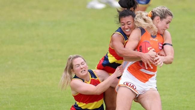 Giant Brid Stack is tackle by Crow Hannah Button in last week’s practice match. Picture: Daniel Kalisz/Getty Images