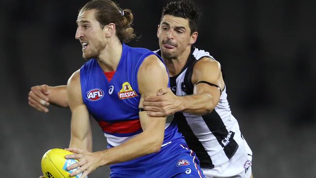 A fitness guru says a three-week pre-season is not enough for footy stars like Marcus Bontempelli and Scott Pendlebury. Picture: Michael Klein