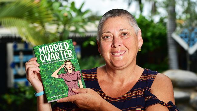 Maria Augustus-Dunn with copies of her book, Married Quarter. Picture: Shae Beplate.