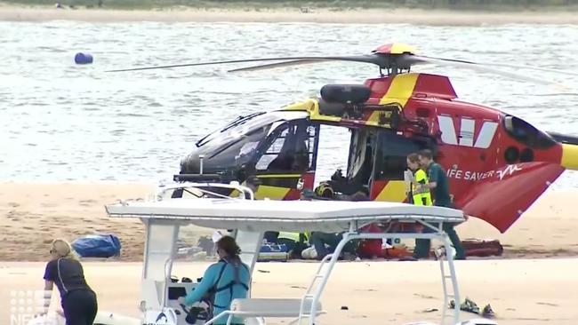 A RACQ LifeFlight Rescue helicopter at the scene. Picture: 9NEWS