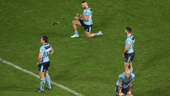 Dejected Blues players react after the final whistle. Photo: Getty Images