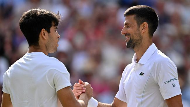 Carlos Alcaraz shakes hands with Novak Djokovic at the end of their men's singles final. Picture: AFP