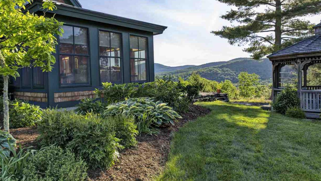 The sprawling gardens overlook mountains. Picture: Supplied