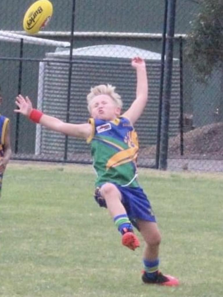 SA Little Legend Brodie Ruchs, 7, from Golden Grove Football Club’s U7s took a belting from a football direct to his little face. This picture is the aftermath just as it hit his face and bounced off. The young footballer hasn’t let it dent his courage in chasing the ball. Picture: Supplied