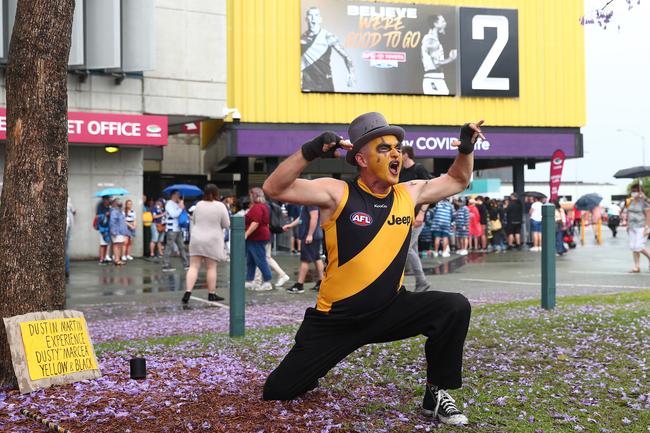 BRISBANE, AUSTRALIA - OCTOBER 24: Tigers fans pose before the 2020 AFL Grand Final match between the Richmond Tigers and the Geelong Cats at The Gabba on October 24, 2020 in Brisbane, Australia. (Photo by Chris Hyde/AFL Photos/via Getty Images)