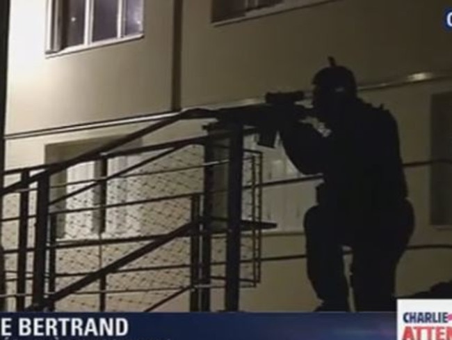 Police surround a property in Reims which is believed to have been used by the three suspects in the Charlie Hebdo massacre