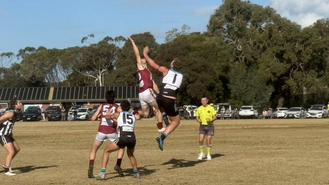 Crib Pont’s Ryan Smith goes up in the ruck.