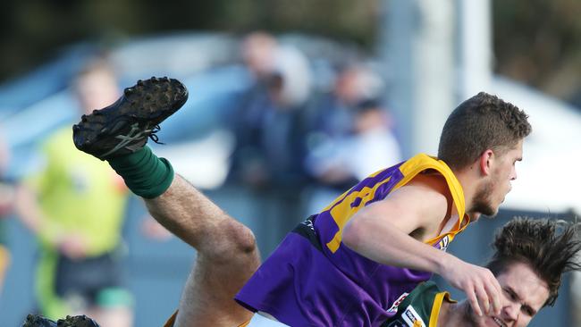 Football GDFL: Werribee Centrals v Thomson. Thomson 34 Jake Alderding tackles Werribee Centrals 43 Josh Sutton Picture: Mark Wilson